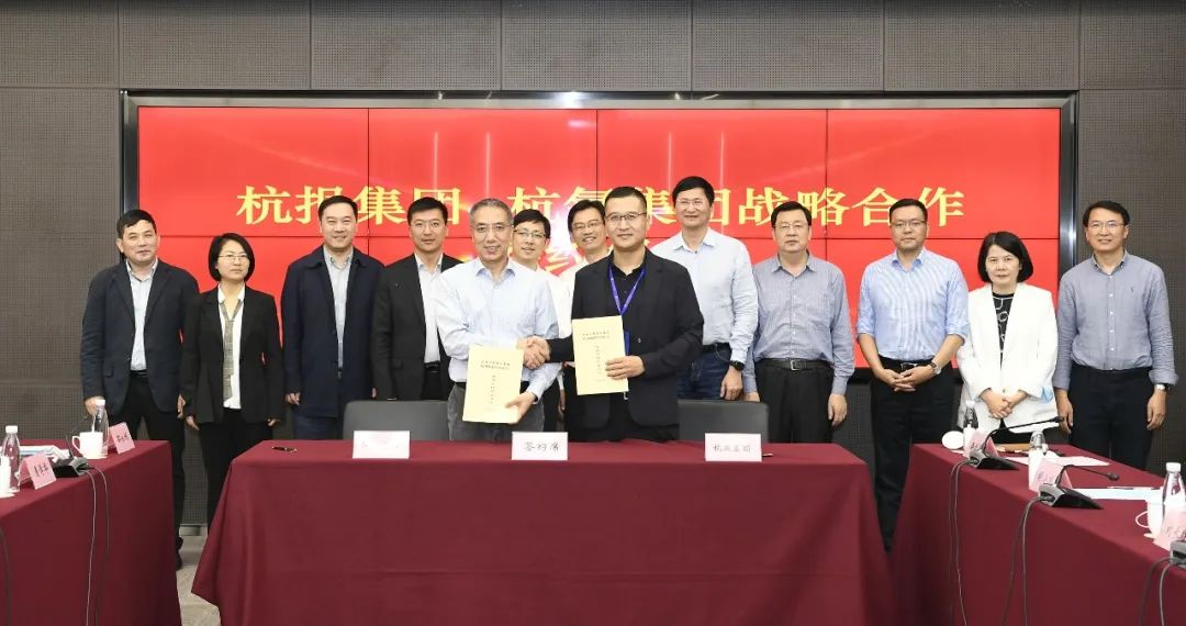 游艇会yth0008集团与杭报集团签订战略合作协议(图1)